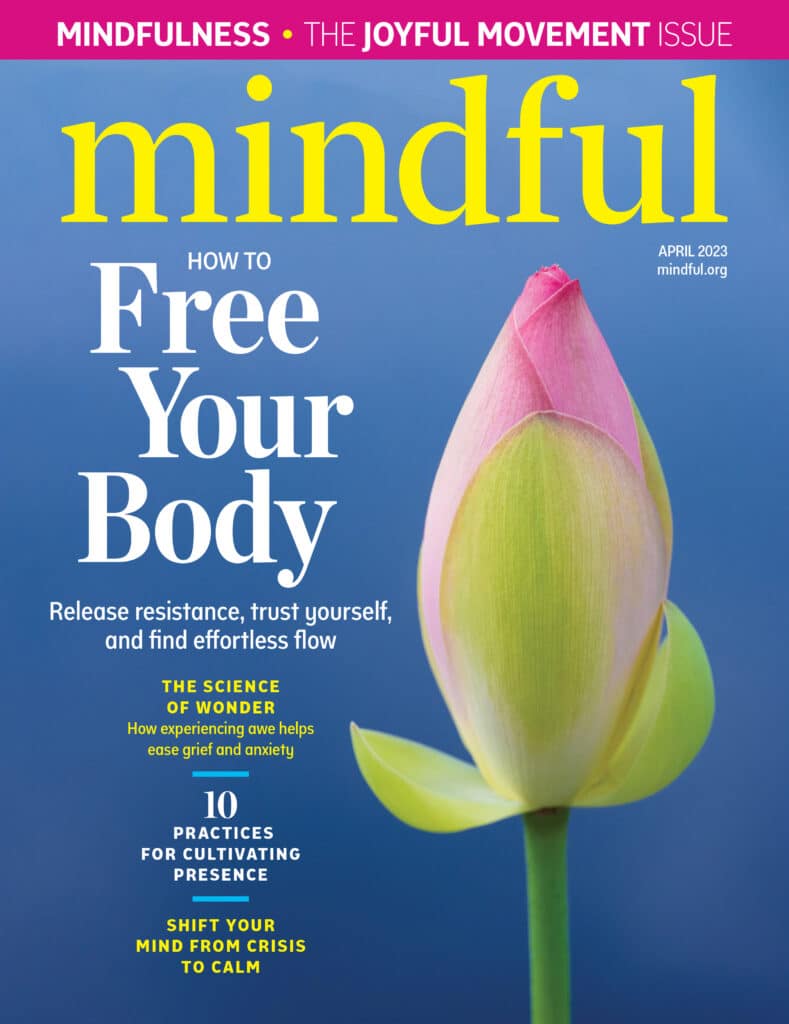 Mindful magazine cover featuring a pink lotus bud with the headline "Free Your Body."