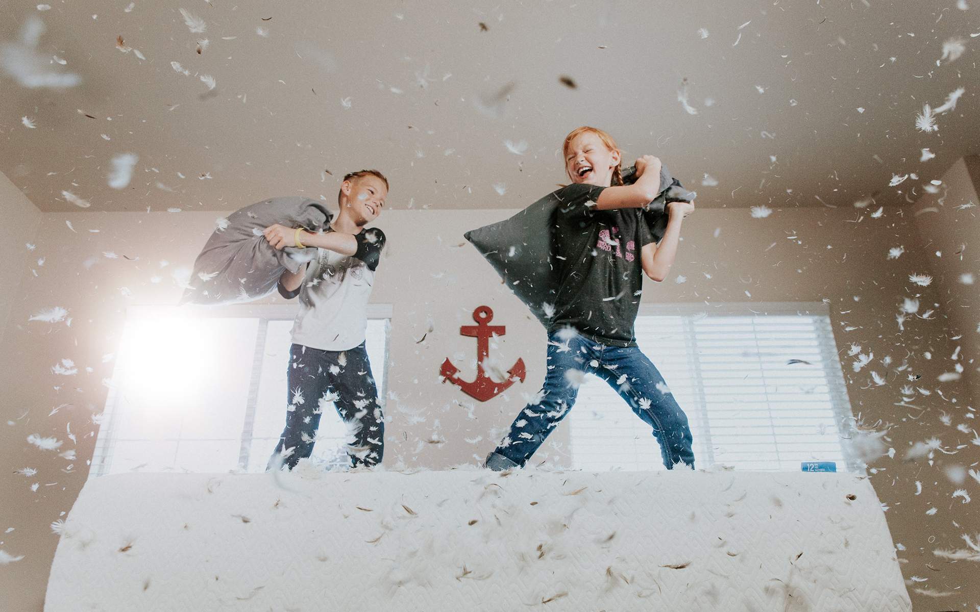 kids having a pillow fight
